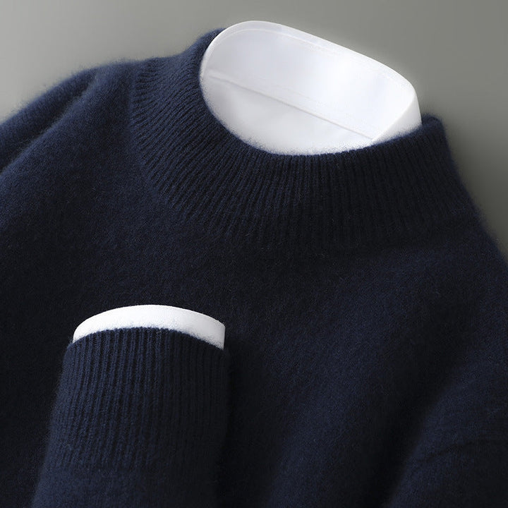 A woman wearing a soft luxe crew neck sweater with a matte finish, styled with smart pants.