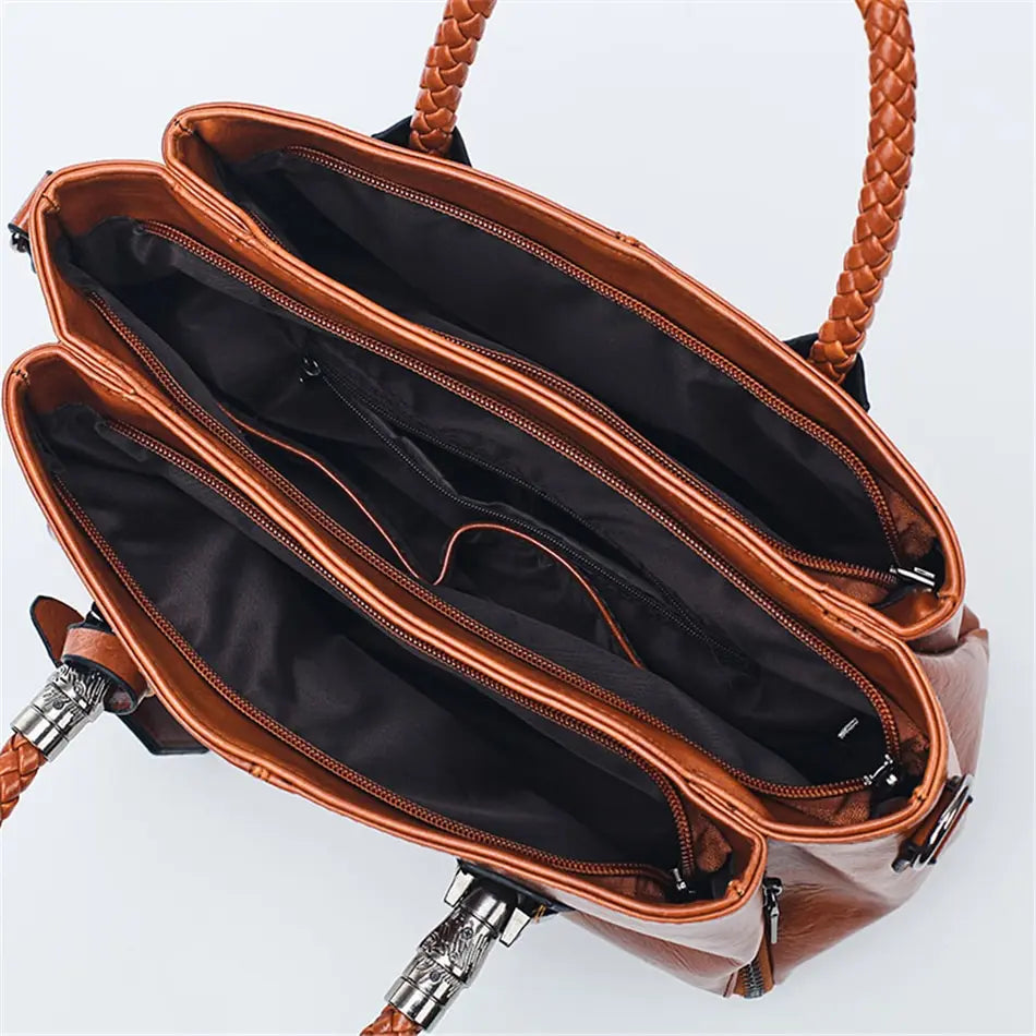 A woman carrying a versatile structured handbag on her shoulder while out in town.