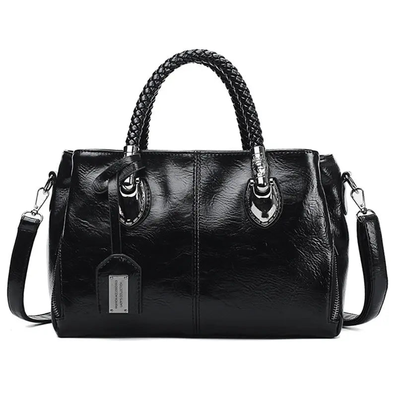 A woman carrying a versatile structured handbag on her shoulder while out in town.
