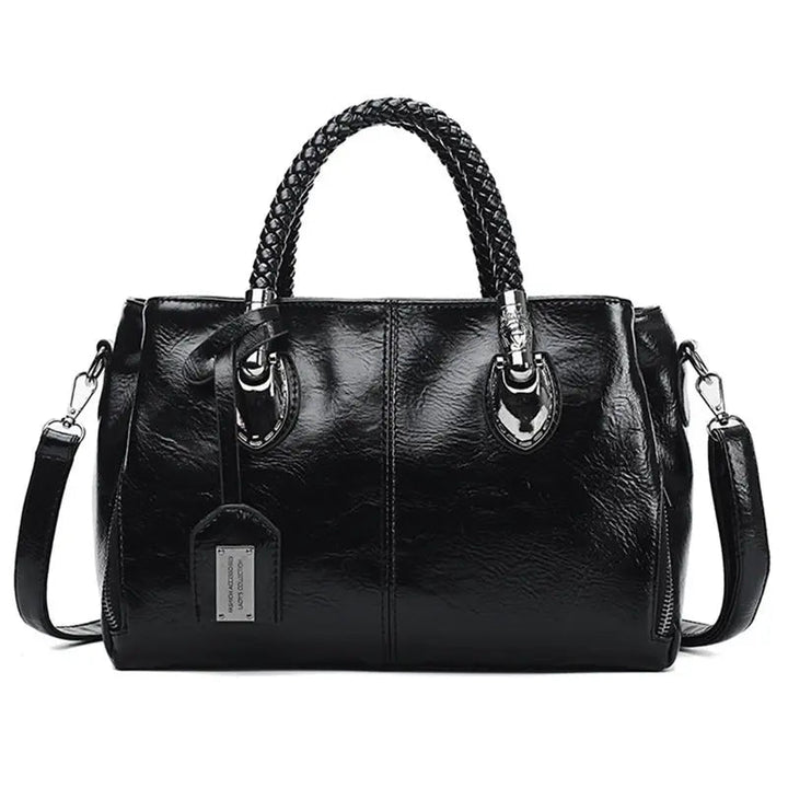 A woman carrying a versatile structured handbag on her shoulder while out in town.