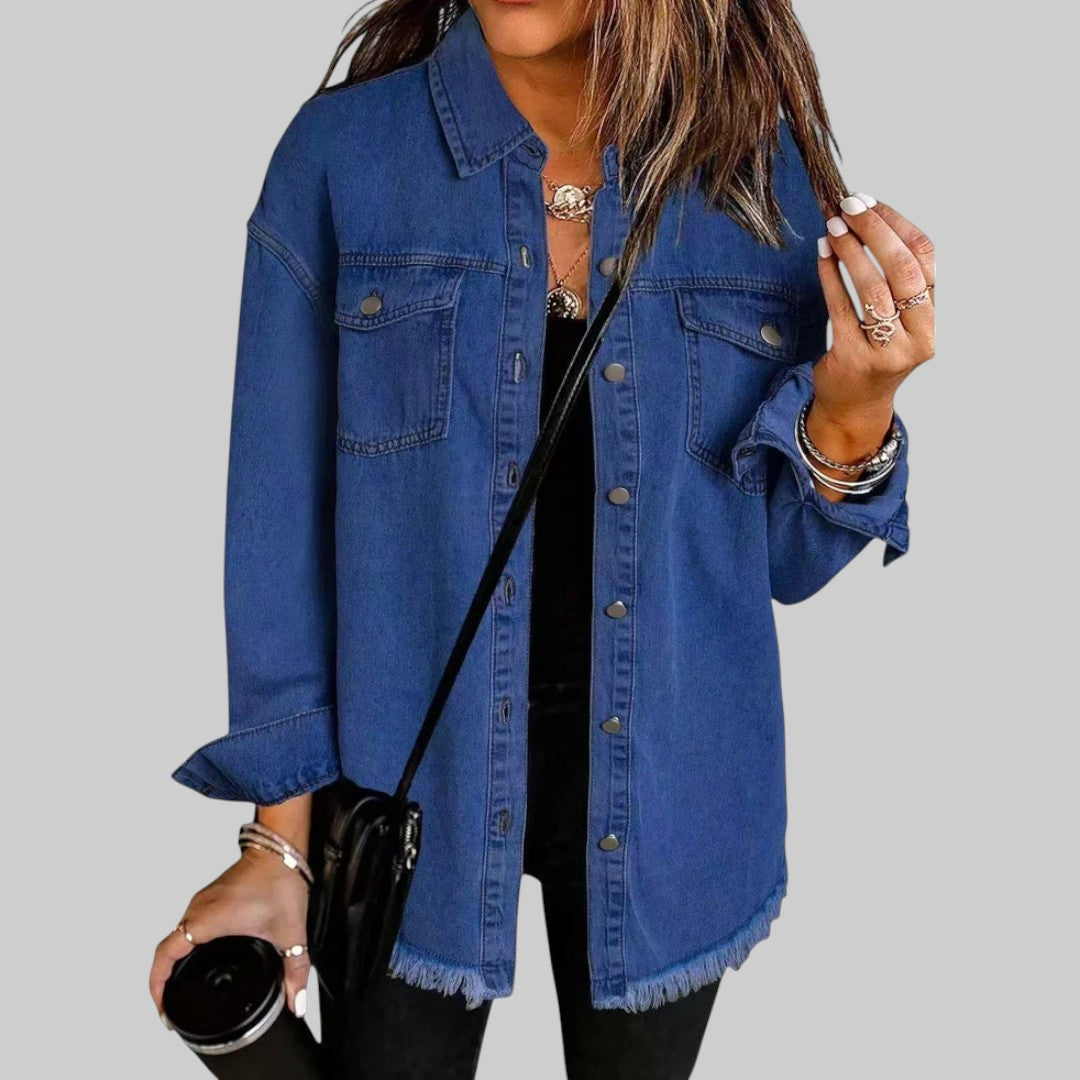 A woman wearing a relaxed casual jacket during an evening walk