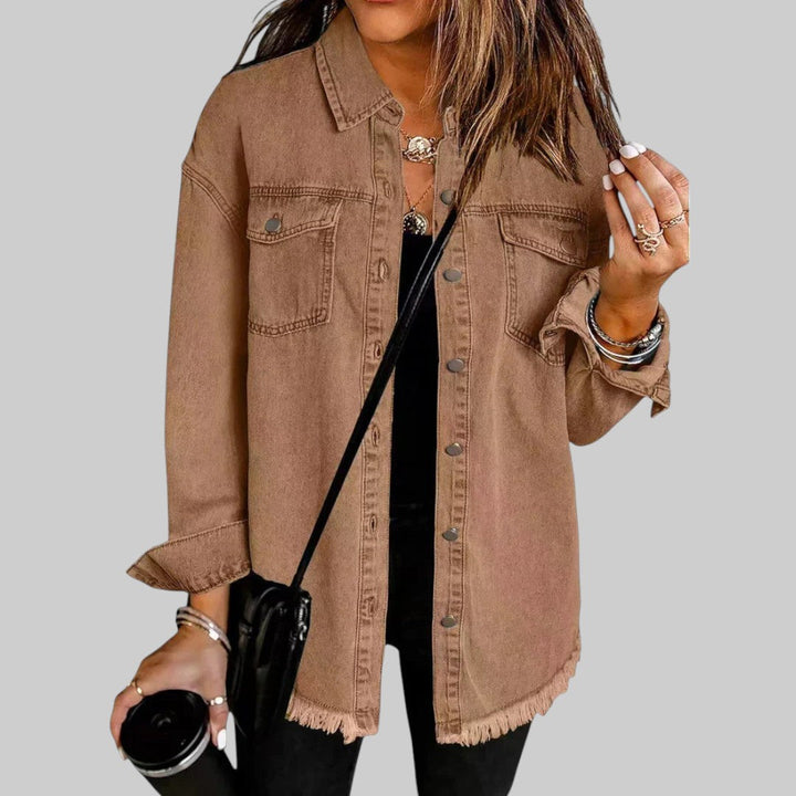 A woman wearing a relaxed casual jacket during an evening walk
