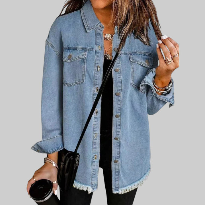 A woman wearing a relaxed casual jacket during an evening walk