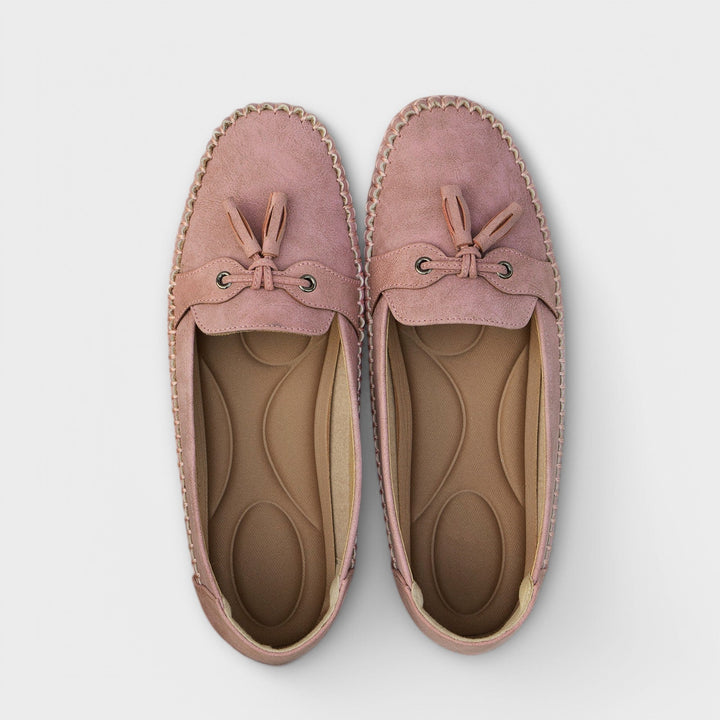 A woman wearing classic loafers on an easy day in town.