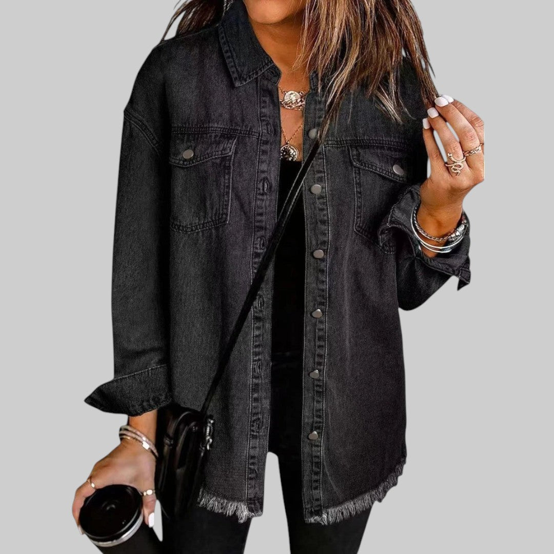 A woman wearing a relaxed casual jacket during an evening walk