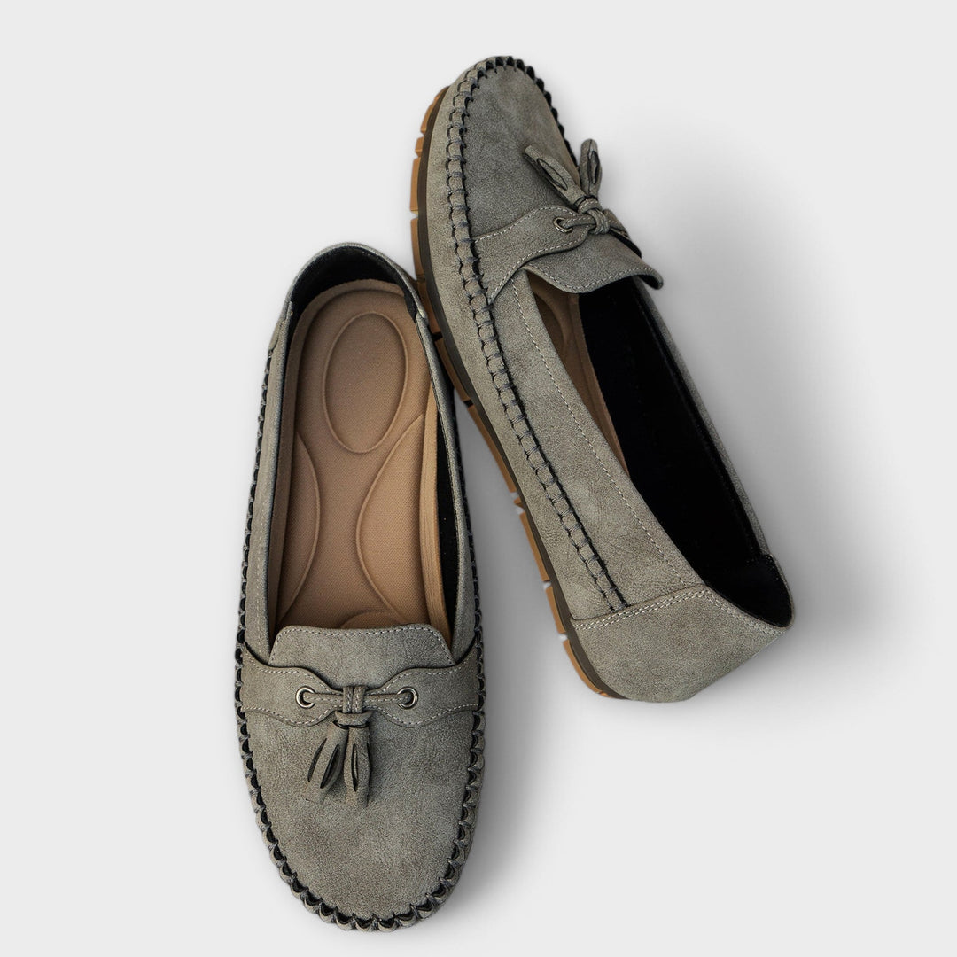 A woman wearing classic loafers on an easy day in town.