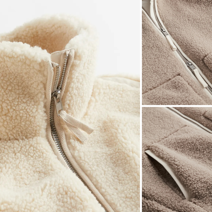 A soft, textured winter jacket with a tall stand collar, zip front and patch pockets