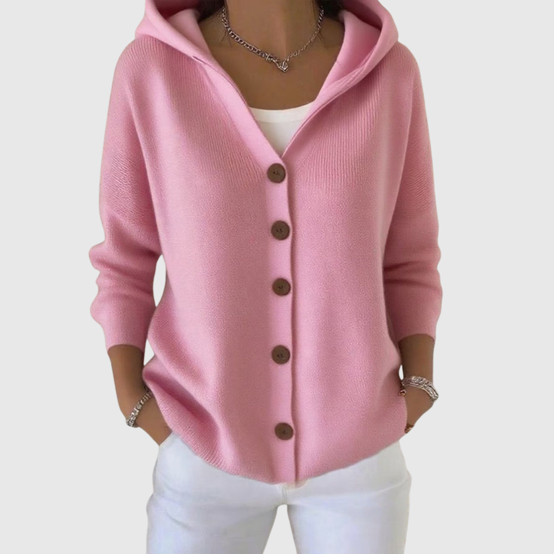 A woman wearing a hooded button cardigan open over a top for a relaxed everyday look.