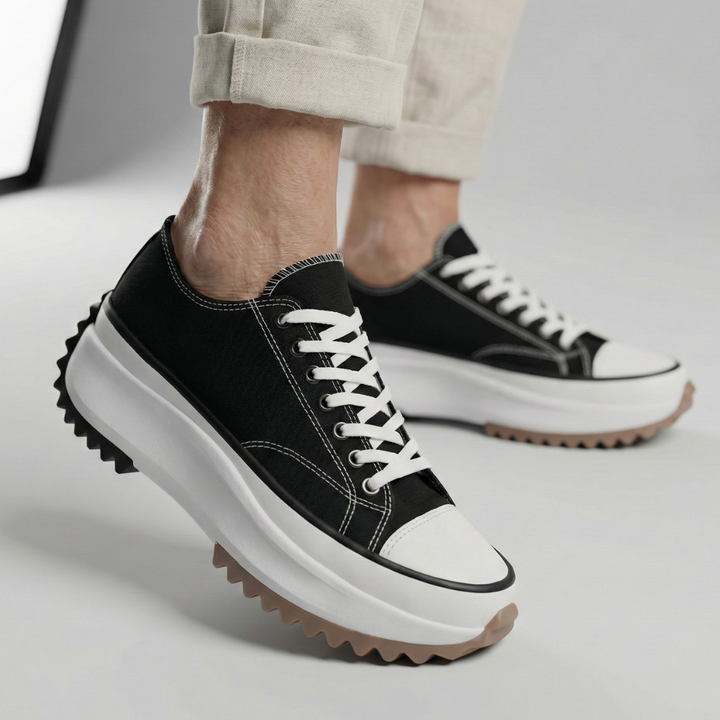 A woman in platform comfort sneakers giving a flattering little lift.