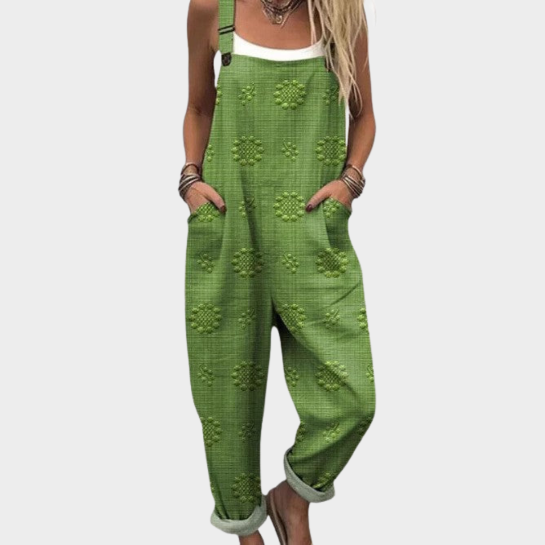 Woman wearing fresh grass green textured overalls with adjustable straps, relaxed and natural.