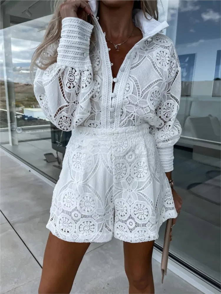 A woman wearing an elegant two-piece set with delicate openwork detailing