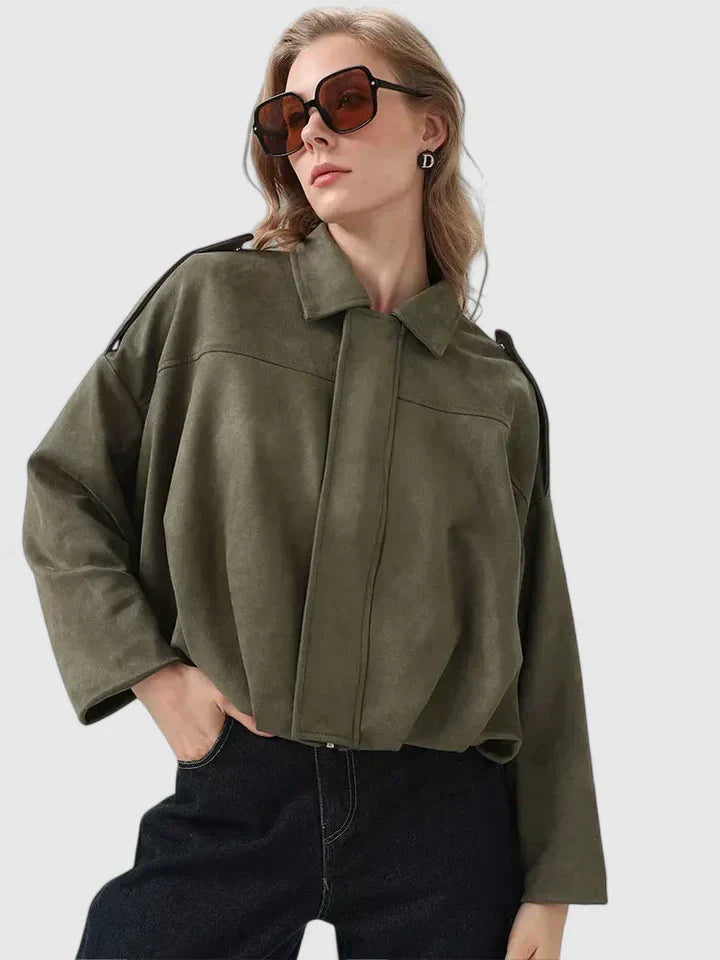 A woman wearing a classic versatile jacket, styled for a smart-casual day out.