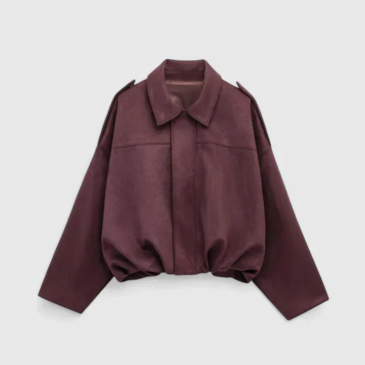 A woman wearing a classic versatile jacket, styled for a smart-casual day out.