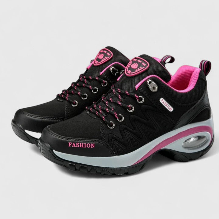 A woman wearing water-resistant comfort sneakers on a wet winter day