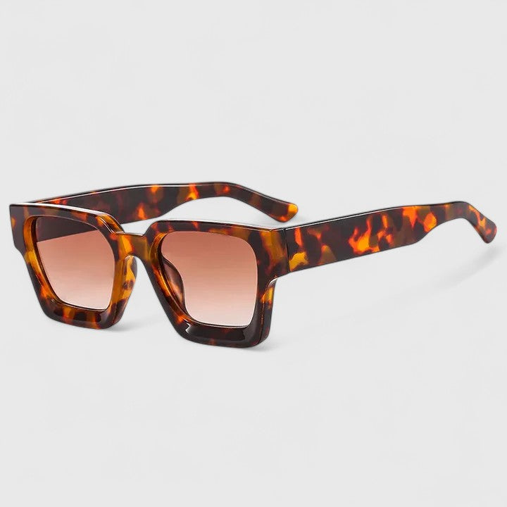 A woman out for the day wearing classic square sunglasses, relaxed and stylish in the sun.