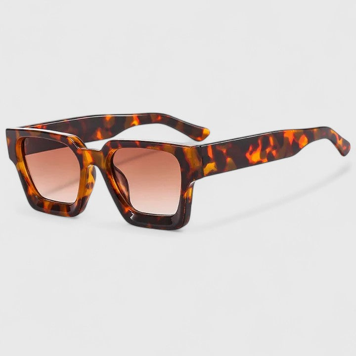 A woman out for the day wearing classic square sunglasses, relaxed and stylish in the sun.