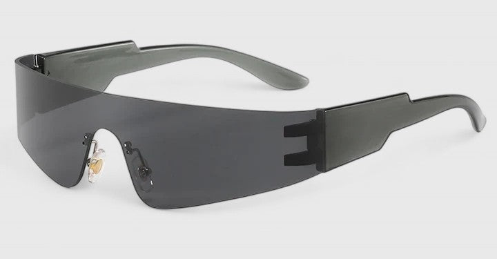 A pair of rimless wraparound sunglasses with a curved mirrored lens and flat black arms.