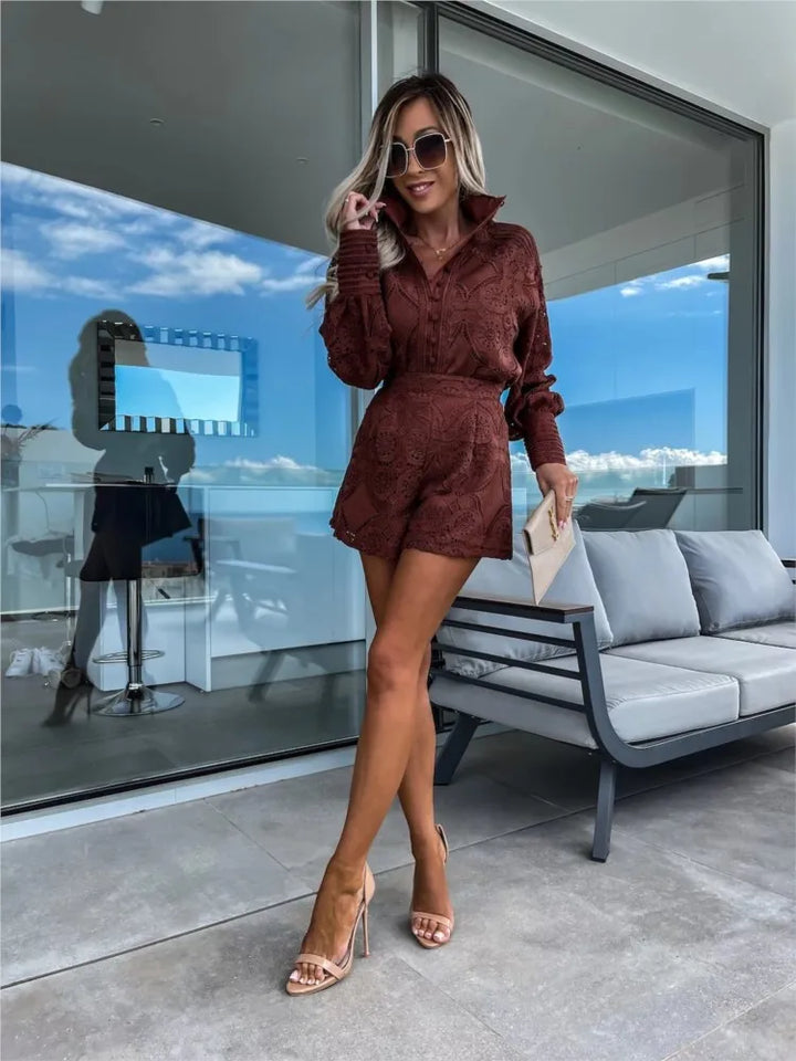 A woman wearing an elegant two-piece set with delicate openwork detailing