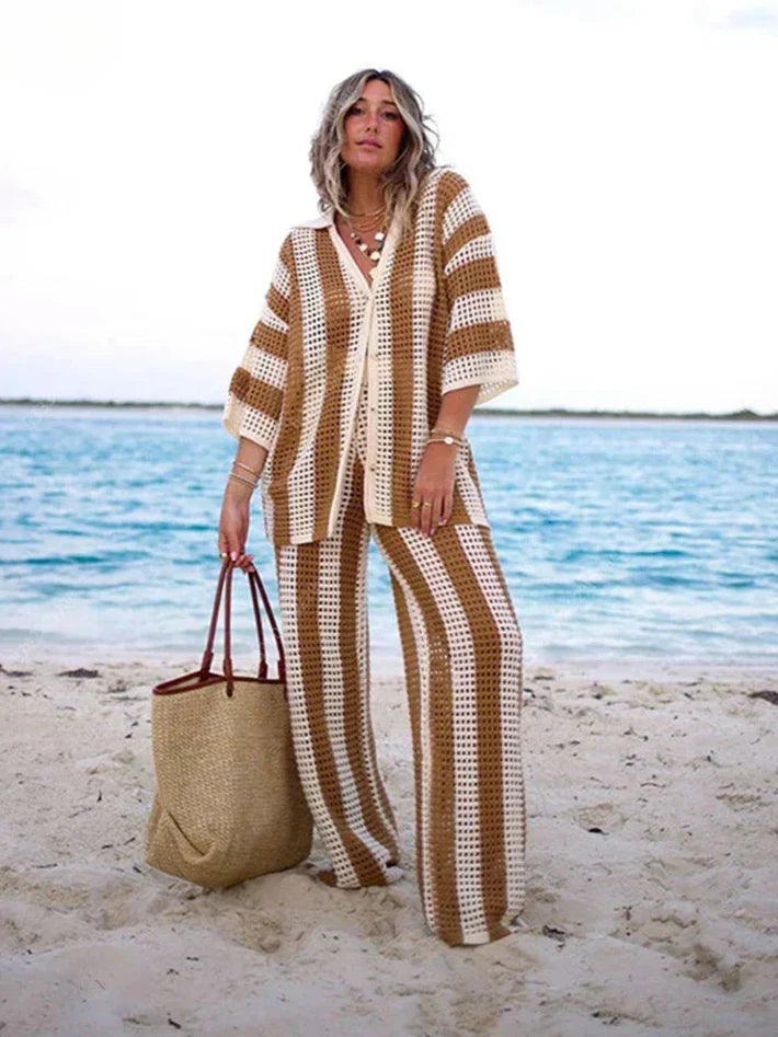 A woman wearing a striped boho-style two-piece set