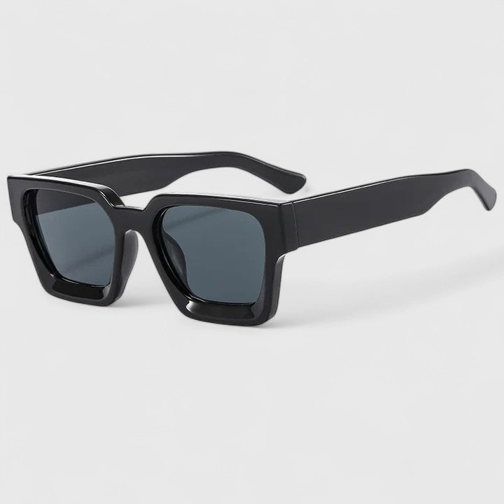 A woman out for the day wearing classic square sunglasses, relaxed and stylish in the sun.