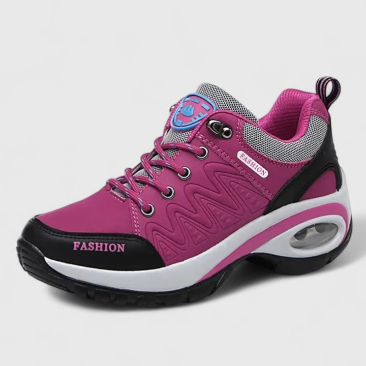 A woman wearing water-resistant comfort sneakers on a wet winter day