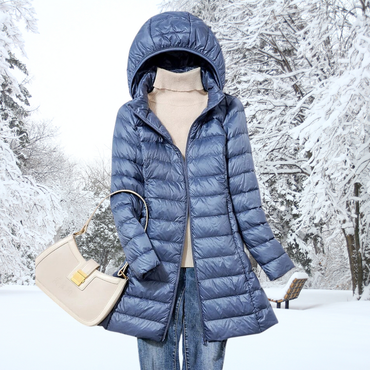 A rail of ultra-light padded hooded coats in pink, red, khaki and black, knee-skimming in length.