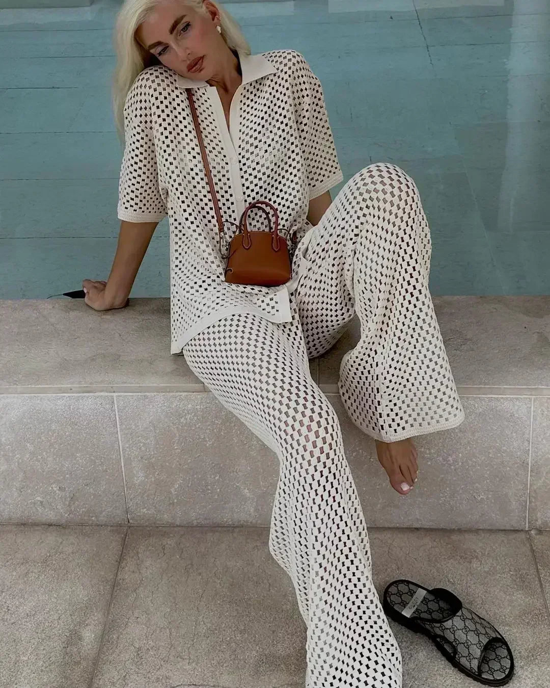 A woman wearing a striped boho-style two-piece set