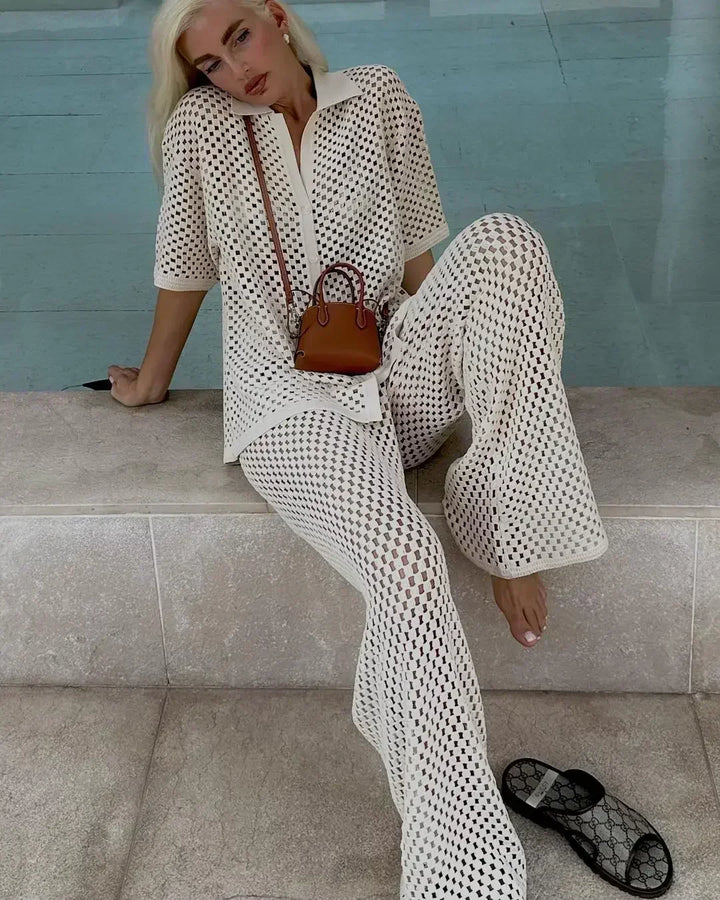 A woman wearing a striped boho-style two-piece set