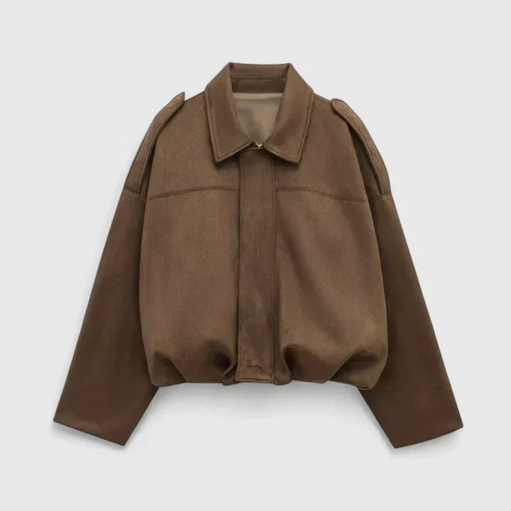 A woman wearing a classic versatile jacket, styled for a smart-casual day out.