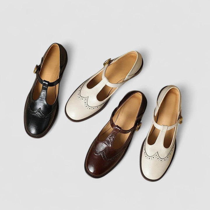 A woman in beige T-strap Mary Jane shoes, comfortable and balanced on a busy day.