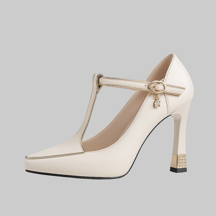 A woman in embellished T-strap block heels with sparkling detail at an evening celebration.