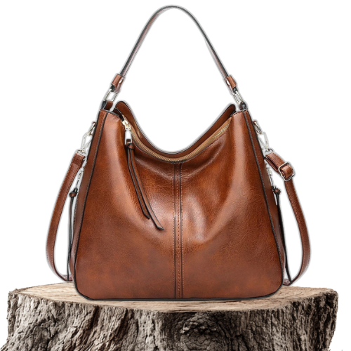 A woman holding a timeless classic handbag with a rich finish by her side