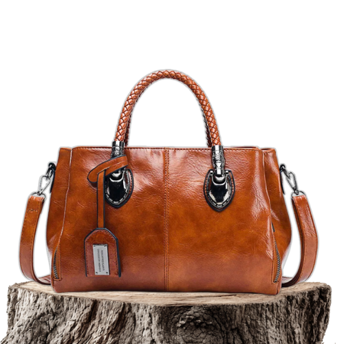 A woman carrying a versatile structured handbag on her shoulder while out in town.