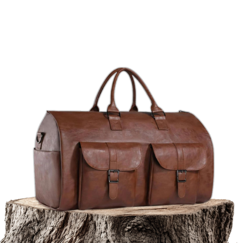 A brown travel holdall with twin top handles and two buckled front pockets resting on a wooden stump.