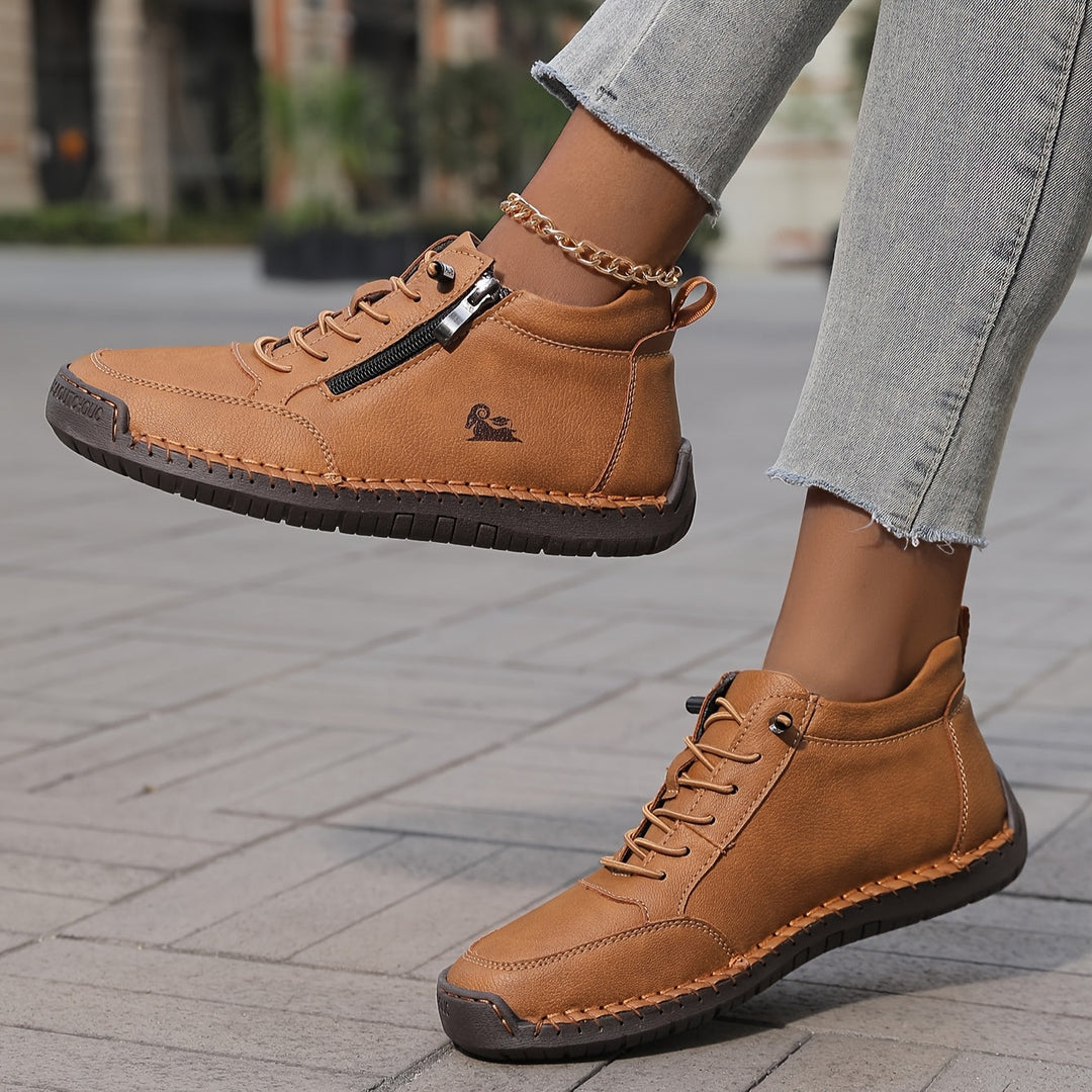 A woman standing comfortably in wide-fit therapeutic comfort shoes