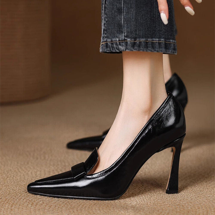 A woman in pointed refined heels stepping out confidently to a festive gathering.