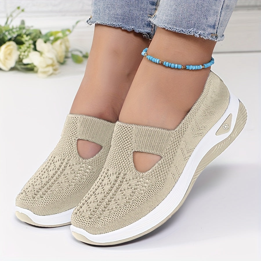 A woman stepping into easy slip-on comfort sneakers with no laces.