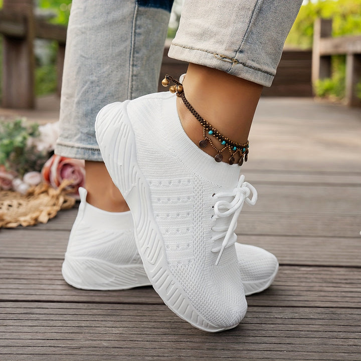 A woman wearing ultra-light comfort sneakers on a long walk