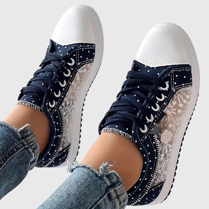 A woman walking comfortably in blue cushioned orthopaedic sneakers
