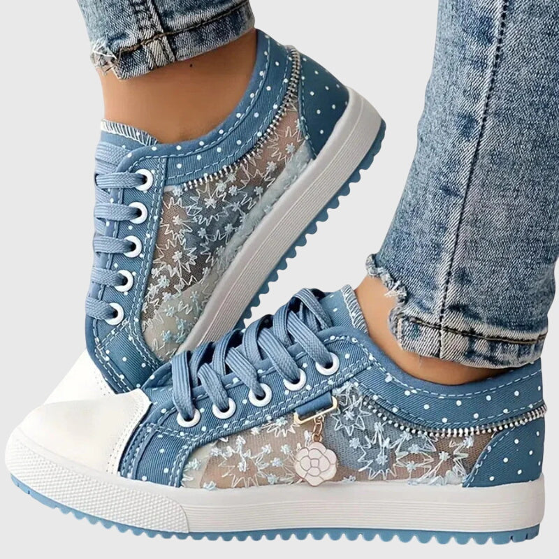 A woman walking comfortably in blue cushioned orthopaedic sneakers