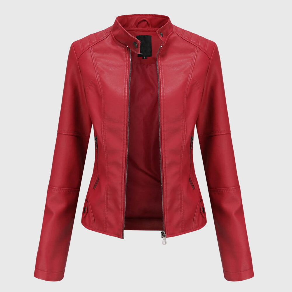 A woman wearing a fitted black moto jacket with a supple finish, styled for an evening out.