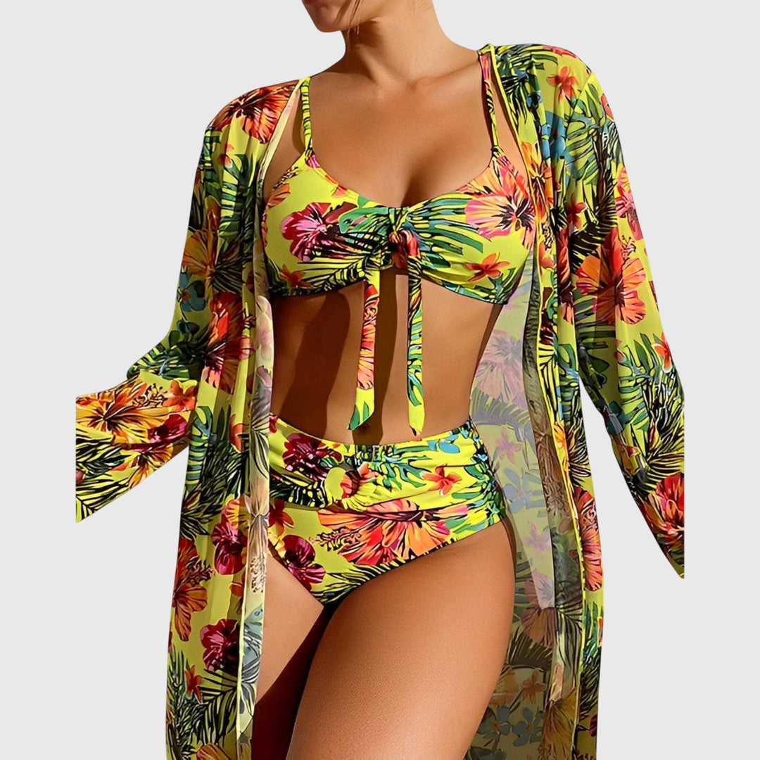 A woman by the pool in a matched printed bikini set, relaxed and confident in the summer sun.