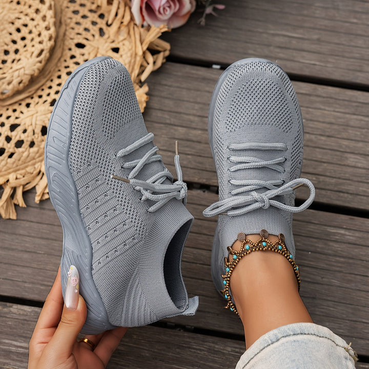 A woman wearing ultra-light comfort sneakers on a long walk