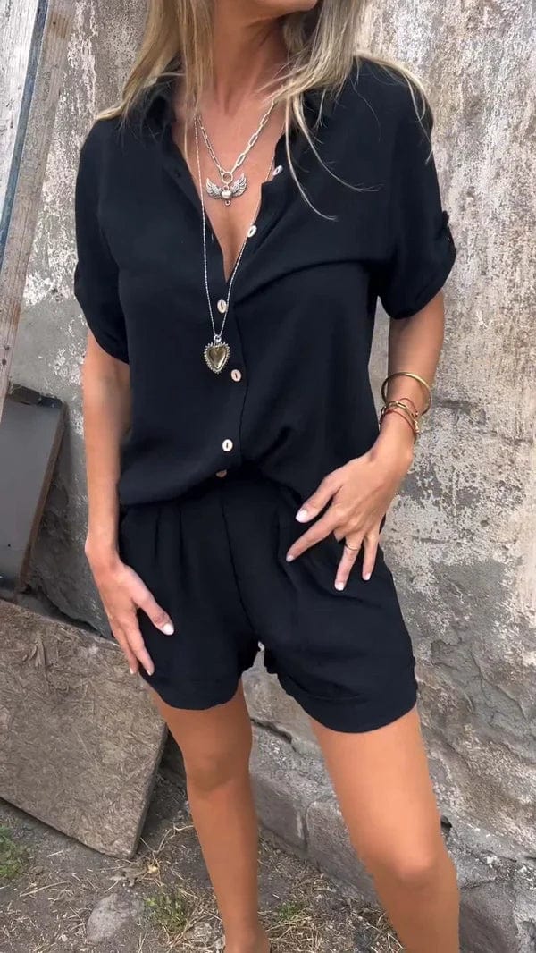 A woman in a coordinated button top and shorts set, styled for an easy sunny summer look.