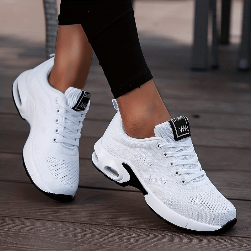 A woman walking further in breathable, air-cushioned non-slip sneakers.
