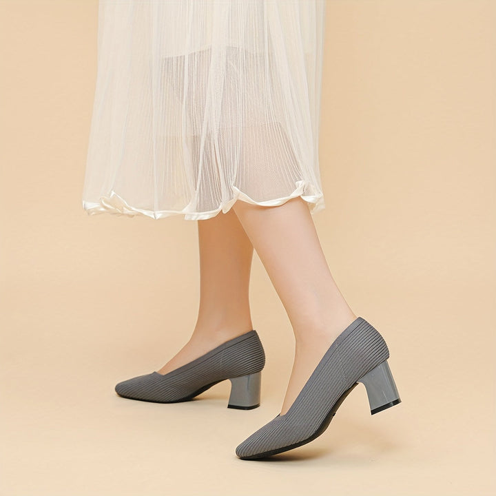 A woman in cushioned arch-support heels comfortably on her feet through a busy day.