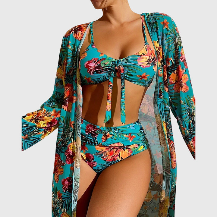 A woman by the pool in a matched printed bikini set, relaxed and confident in the summer sun.