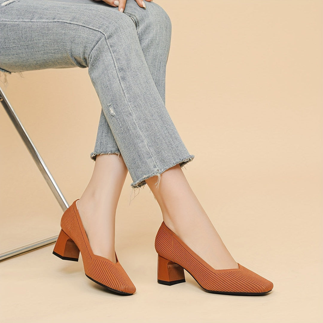A woman in cushioned arch-support heels comfortably on her feet through a busy day.