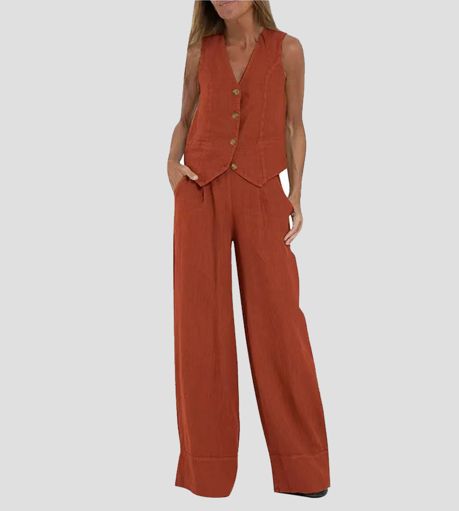 A woman wearing a tailored waistcoat with flowing wide-leg pants