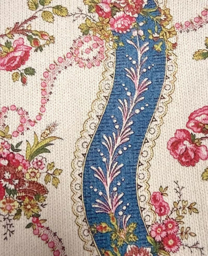 Women's cream cardigan with climbing roses and ribbon borders